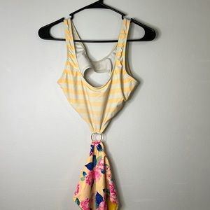 One piece yellow and floral swimsuit. Size medium. Like new.